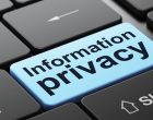 Information Privacy on computer keyboard background