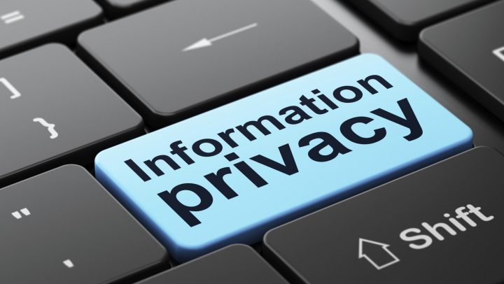 Information Privacy on computer keyboard background
